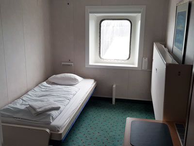 Der Schlafbereich einer Einzel-Au&szlig;en-Kabine